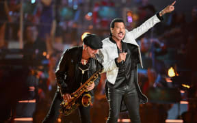 US pop star Lionel Richie performs inside Windsor Castle grounds at the Coronation Concert, in Windsor, west of London on May 7, 2023. - For the first time ever, the East Terrace of Windsor Castle will host a spectacular live concert that will also be seen in over 100 countries around the world. The event will be attended by 20,000 members of the public from across the UK.