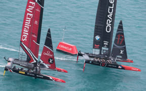 Emirates Team New Zealand and Oracle Team USA racing during the Louis Vuitton America's Cup Qualifiers at the 35th America's Cup, Bermuda, 2017.
