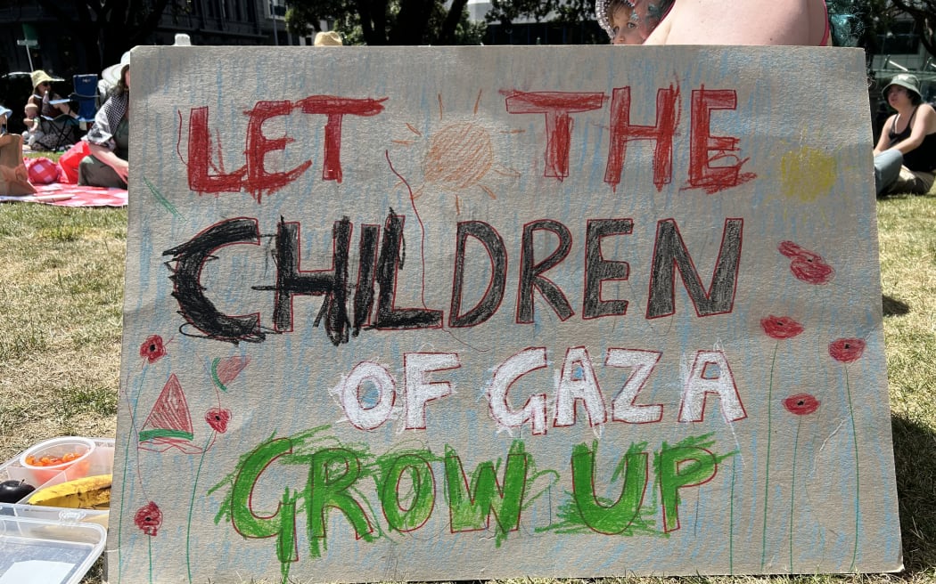 Families and children gather for a picnic on Parliament's lawn calling for a ceasefire in Gaza on 25 January 2024.