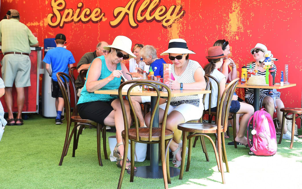 Tennis fans enjoy a break from the on-court action at the ASB Classic.
