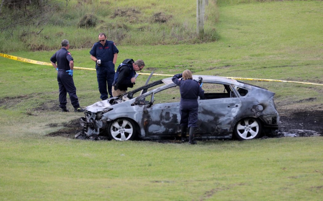 A body was found next to a burnt out car in Muriwai on the morning of 3 June 2025.