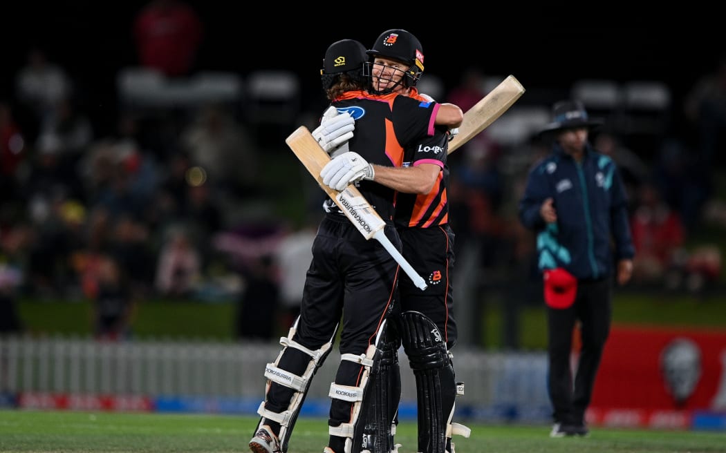 Ben Pomare and Scott Kuggeleijn celebrate winning the Northern Brave Super Smash Grand Final, 2026.