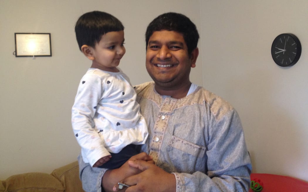 Mohammad Mohiuddin with his year-old daughter Zara, who has been diagnosed with cancer.