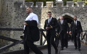New Zealand's Owen Franks, Dan Carter, Kieran Read and Victor Vito attend a welcoming ceremony for the New Zealand All Blacks team at the Tower of London.