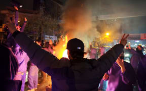 TEHRAN, IRAN - JANUARY 8: Fires are lit as protesters rally on January 8, 2026 in Tehran, Iran. Demonstrations have been ongoing since December, triggered by soaring inflation and the collapse of the rial, and have expanded into broader demands for political change.  (Photo by Anonymous/Getty Images)