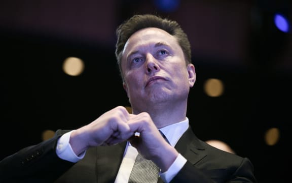 Elon Musk looks on as US President Donald Trump speaks at the US-Saudi Investment Forum at the John F. Kennedy Center for the Performing Arts in Washington, DC on November 19, 2025. (Photo by Brendan SMIALOWSKI / AFP)