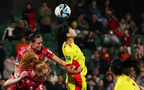 China's midfielder Wu Chengshu heads the ball during the Group D football match between Denmark and China at Perth Rectangular Stadium on 22 July, 2023.