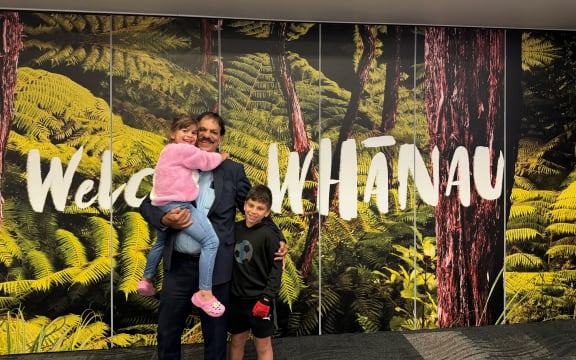Derek Telles reunited with his grandchildren at Auckland Airport.