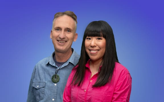 Mark and Perlina stand together smiling