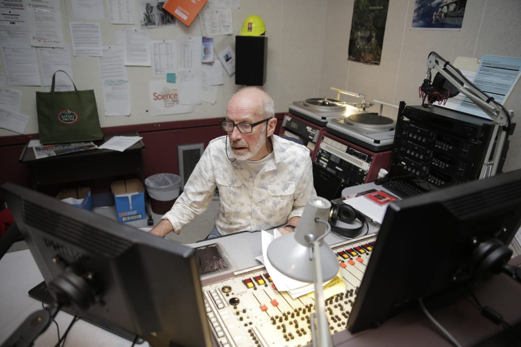 Lloyd in the studio for his final all-night broadcast.