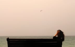 woman on park bench