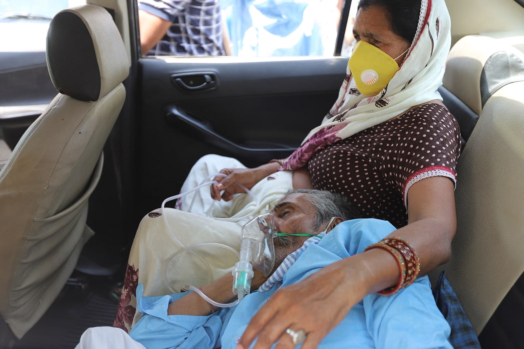 A Covid-19 patient gets oxygen on the spot provided by Sikh Organisation at a Gurdwara in Indirapuram, Ghaziabad, Uttar Pradesh, India on April 24, 2021.