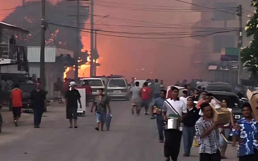The destruction from the 2006 riots, pictured, led Tonga to secure a major Chinese loan to fund reconstruction of the capital. Additional loans were later used for road upgrades and the International Dateline Hotel.

Photo/John Ewen via Wikimedia Commons (CC BY-SA 2.5)