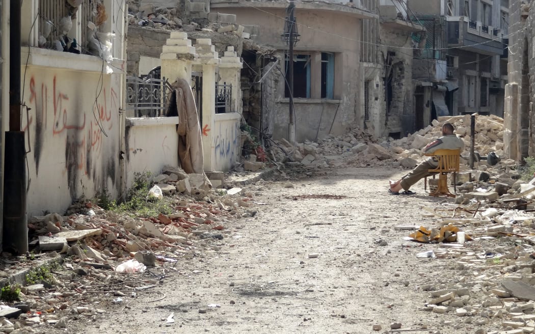 Bombardments have reduced many neighbourhoods to ruins.