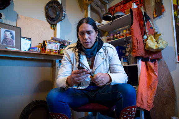 Taupuruariki Brightwell with a chisel given to her by her father, master carver Matahi Brightwell.