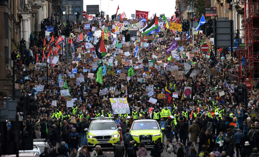Young protesters take part in the Fridays For Future rally in Glasgow, Scotland on November 5, 2021, venue of the COP26 UN Climate Change Conference being held in the city. -