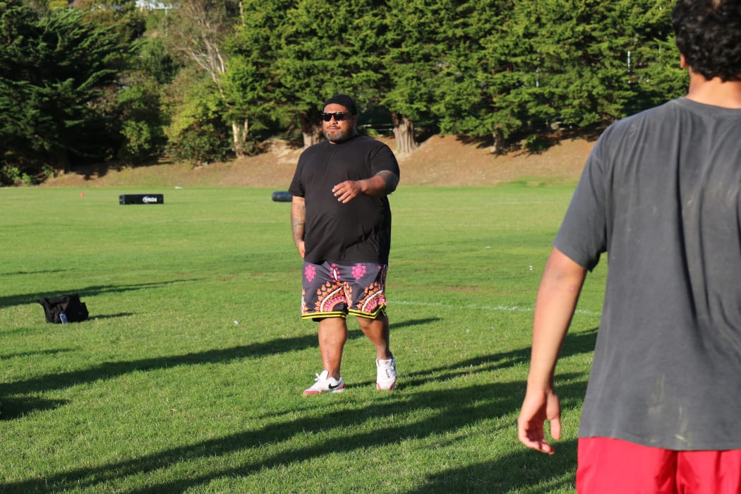 Former All Black Neemia Tialata is helping coach his old First XV at Wellington College.