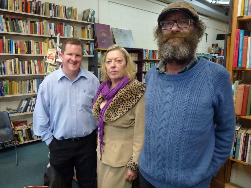 Gary Holmes of the Uptown Business Association (left) and Symonds Street booksellers Deborah and Ron Harcus say the dropping of Newton Station came as a shock.
