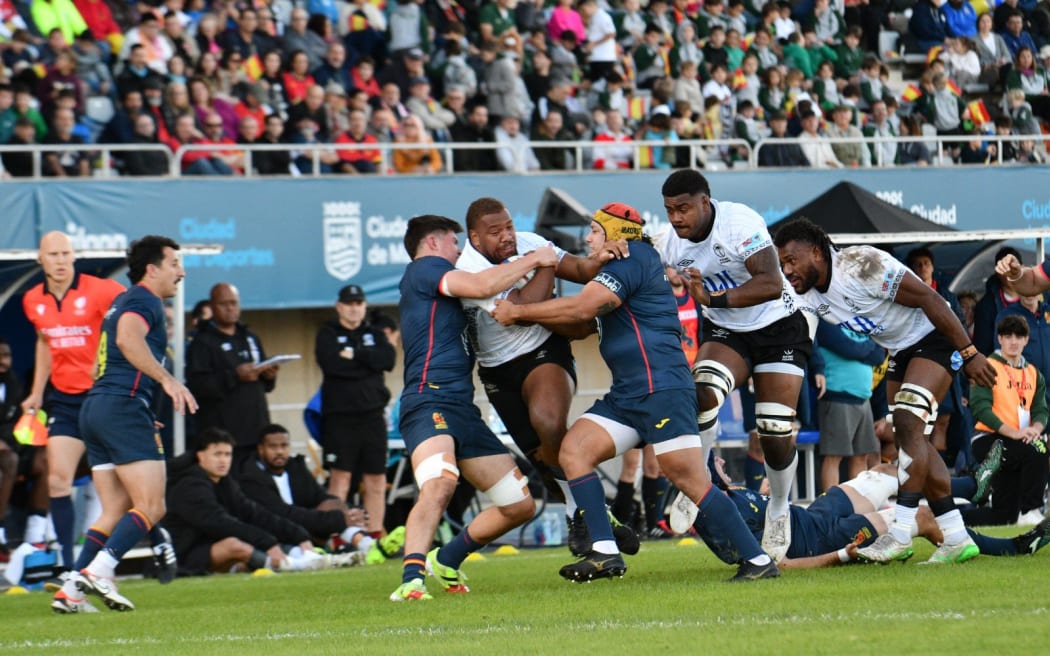 Flying Fijians captain Tevita Ikanivere take on the Spanish in their test. Fiji won.