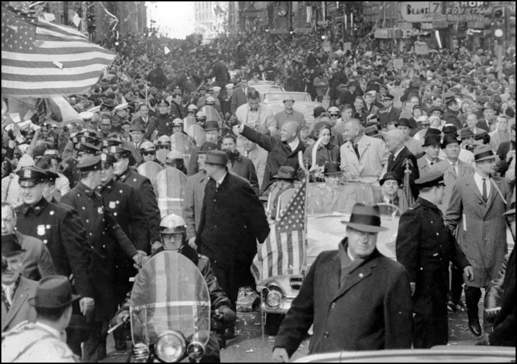 US astronaut John Glenn, centre, being feted in a ticker-tape parade in New York after in his 1962 space flight.