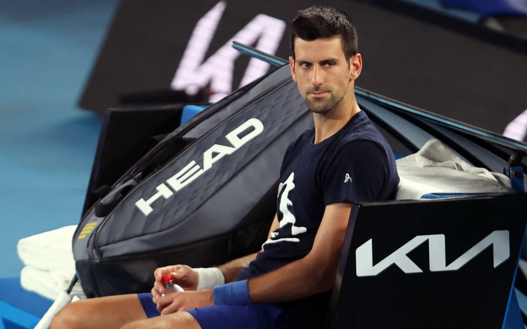 Novak Djokovic attends a practice session on 14 January 2022 ahead of the Australian Open tennis tournament in Melbourne.