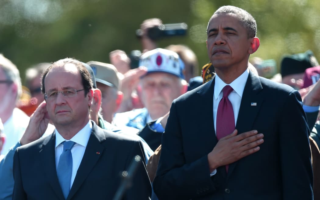 Francois Hollande and Barack Obama at the American Cemetery and Memorial in Colleville-sur-mer.