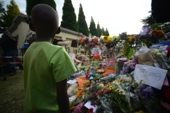 Flowers have been laid outside Nelson Mandela's home in Johannesburg.