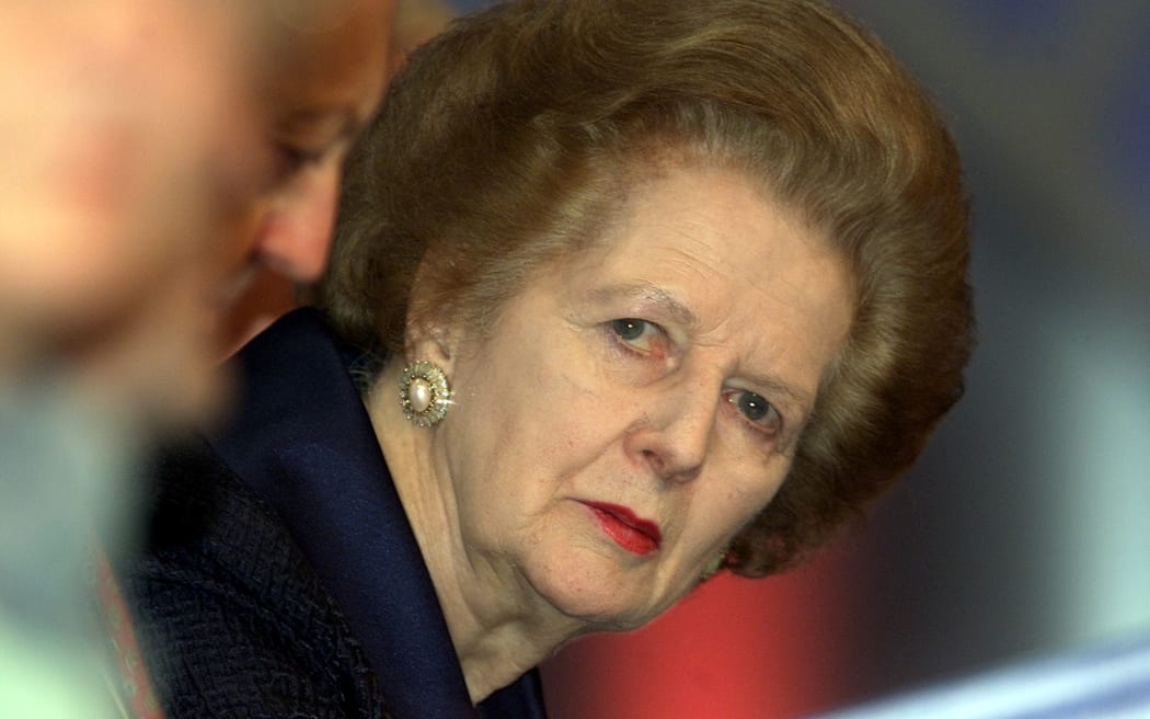 Former British Prime Minister Margaret Thatcher listens to a speaker during a defence session 03 October 2000, on the second day of the Conservative Party Conference in the Bournemouth International Centre. (Photo by GERRY PENNY / AFP)