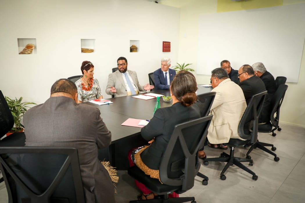 Lord Fakafanua and National MPs Jo Hayes and Tim MacIndoe talk with Tonga MPs about running a constituency office.