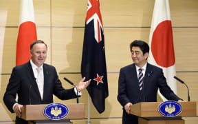 John Key and Japanese Prime Minister Shinzo Abe after meeting in Tokyo.