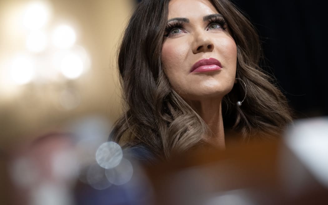 US Secretary of Homeland Security Kristi Noem looks on as she testifies during a House Homeland Security Committee hearing titled "Worldwide Threats to the Homeland" on Capitol Hill in Washington, DC, on December 11, 2025. Noem said Thursday that the US seizure of an oil tanker the day before targeted Venezuelan leader Nicolas Maduro's "regime," which she accused of trafficking drugs to the United States. (Photo by SAUL LOEB / AFP)