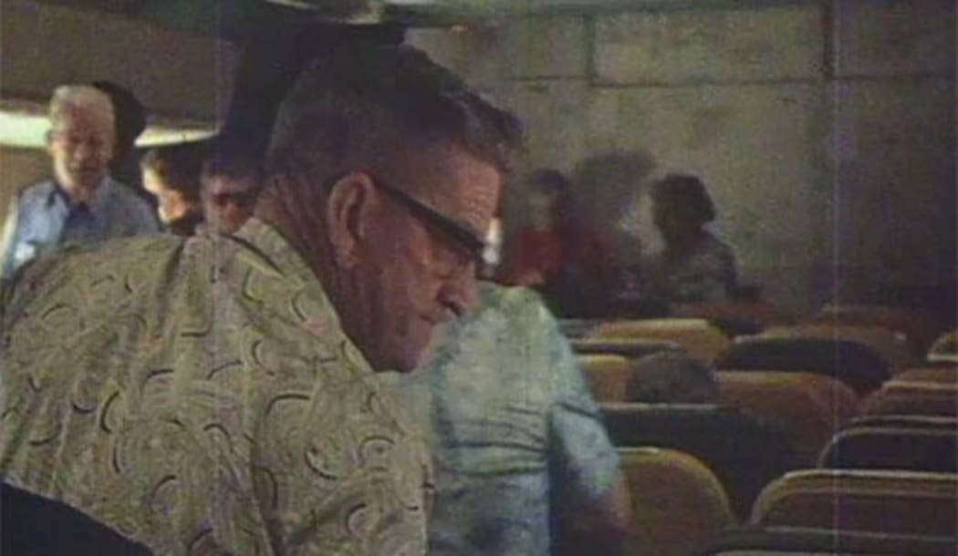 Frank Christmas takes his seat as Air New Zealand flight TE901 flies over Antarctica.