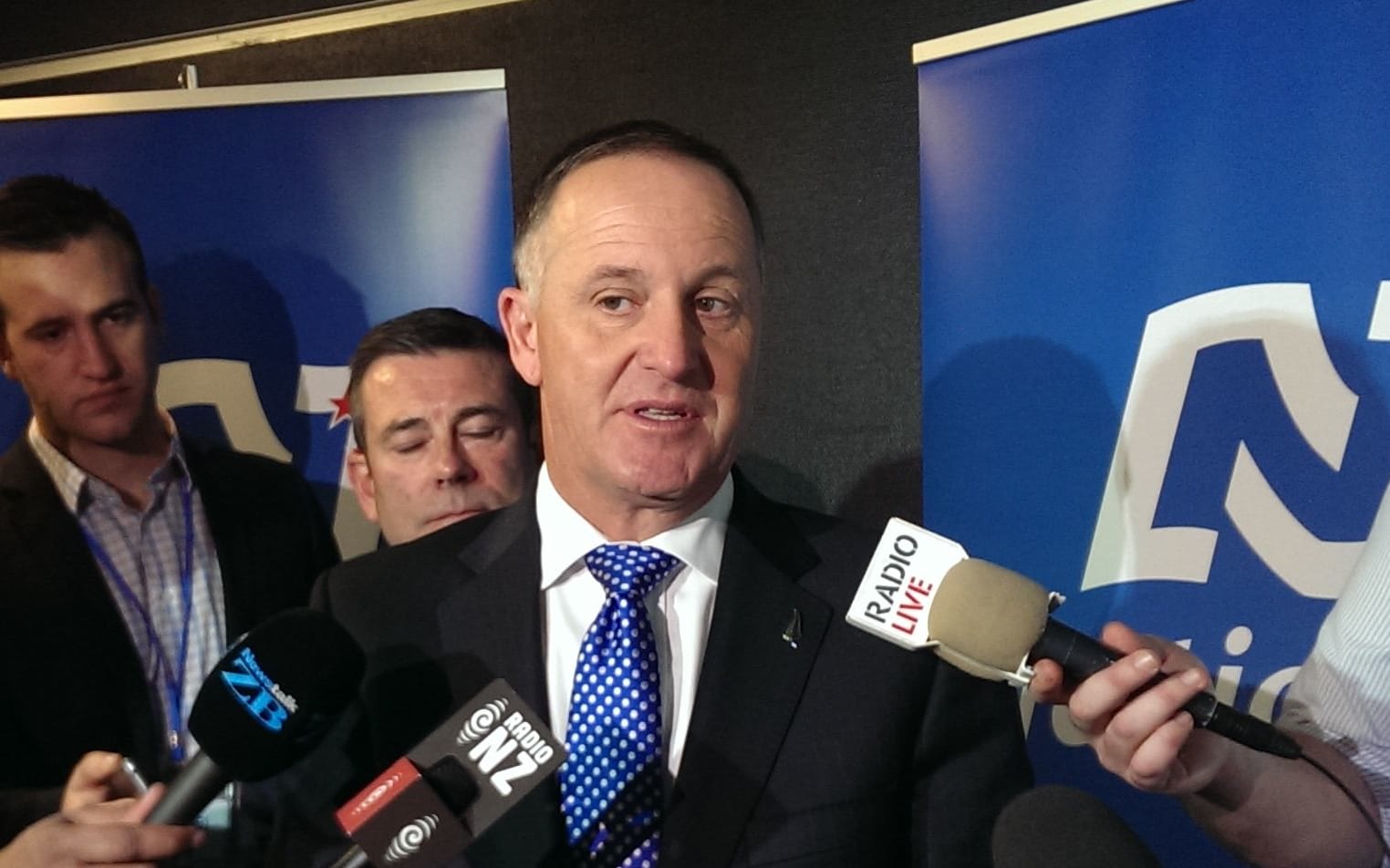 John Key talking to media after his leader's speech.