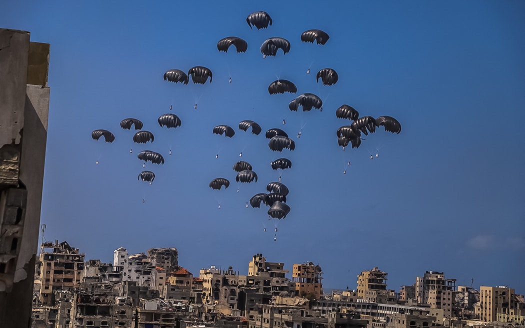 Packages of aid landing on parts of Gaza, dropped from the air by planes in an attempt to ease the dire humanitarian crisis on the strip on 30 April, 2024.